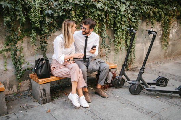 istock Business people sitting on a bench 1393557094
