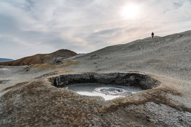 istock Mud volcano in mountains. Amazing natural phenomenon 1393557232