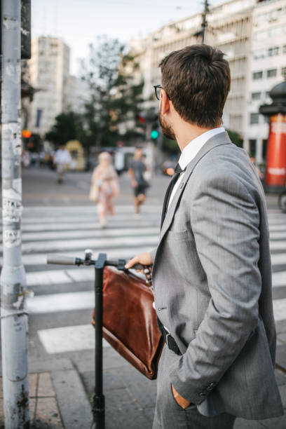 istock Businessman on a pedestrian crosswalk 1393557258