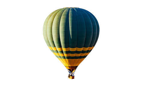 Green hot air balloon flying isolated on white background with clipping path.