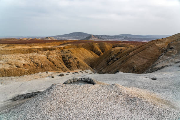 istock Mud volcano in mountains. Amazing natural phenomenon 1393557560