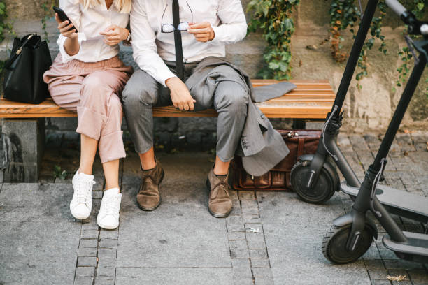 istock Business people sitting on a bench 1393558002