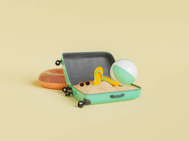чемодан с песком и мячом - beach suitcase vacations summer стоковые фото и изображения
