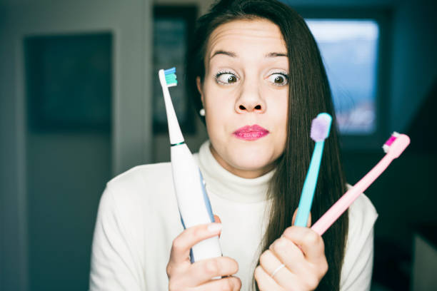 Say goodbye to classing toothbrush for an electric one stock photo