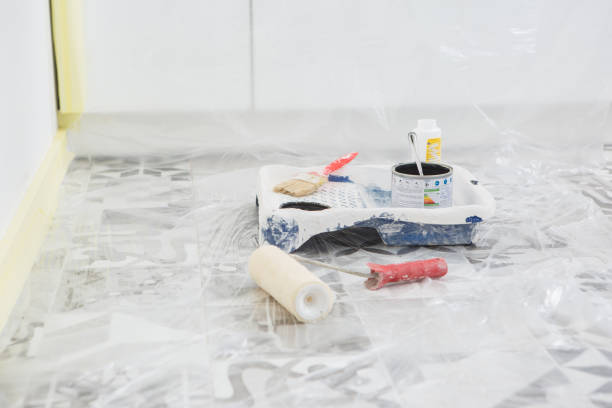 istock Painting accessories, paint roller, tray, paint brushes, paint can 1393566781
