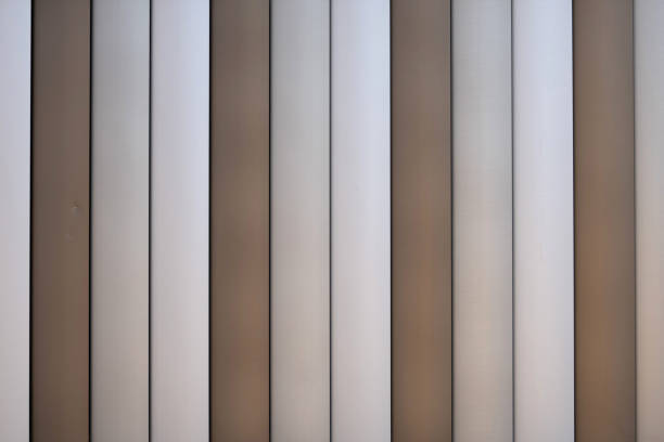 Strips lines or battens wall or fence pattern surface texture. Close-up of interior material for design decoration background. Vertical strips lines or battens wall or fence pattern surface texture. Close-up of interior material for design decoration background. corrugated metal fence ideas stock pictures, royalty-free photos & images