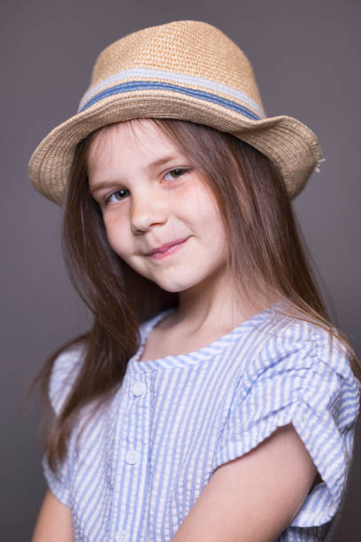 istock Cute girl wearing a hat 1393567475