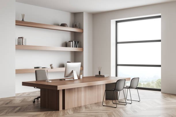 istock Light office interior with chairs and work desk, decoration and panoramic window 1393568499