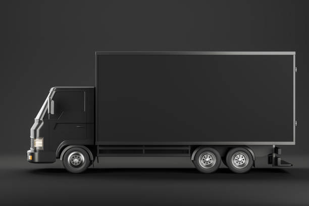 Black trailer body, isolated over black background. Concept of shipment and delivery. Mock up copy space for text and logo. 3D rendering