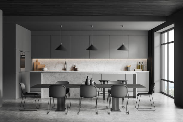 istock Grey kitchen set interior with eating table and seats, countertop and window 1393571831