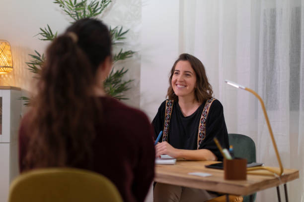 istock A female therapist talking to a client 1393574406