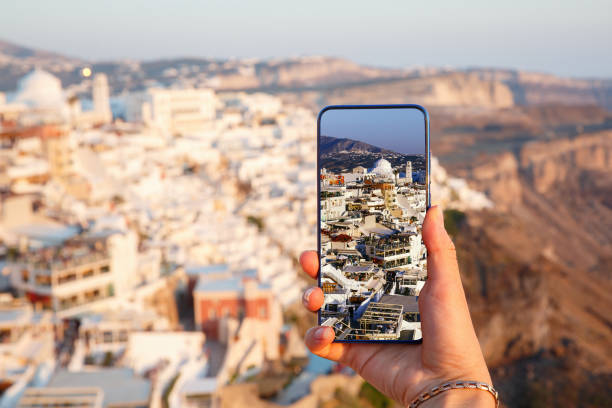istock Taking photos using camera of mobile phone. 1393577811