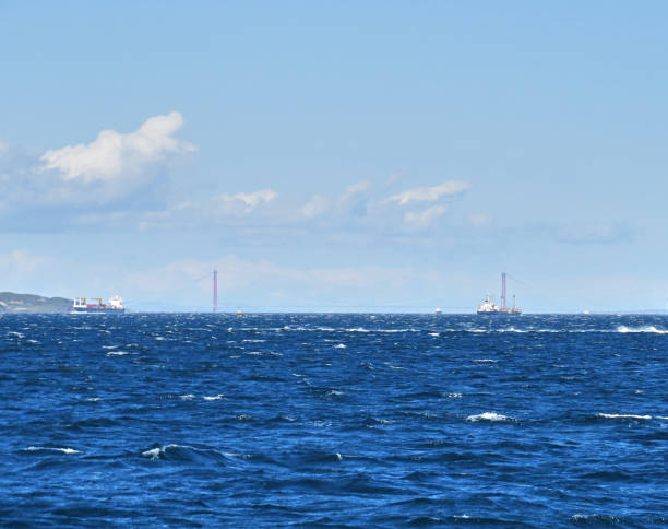 istock Cargo ship crossing the strait , 1915 Canakkale Bridge in background 1393578322