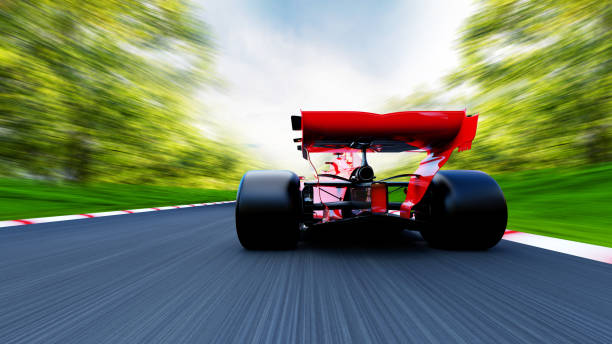 istock red race car driving on a race track 1393578967