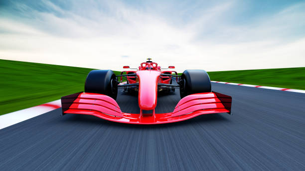 istock red race car driving on a race track 1393578983