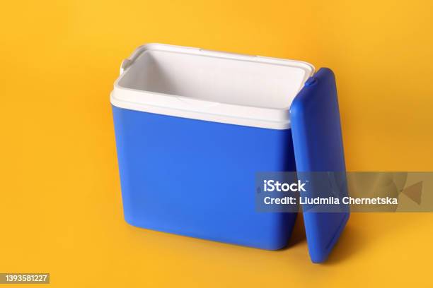 Open Blue Plastic Cool Box On Orange Background Stock Photo - Download Image Now - Cooler - Container, Beach, Blue