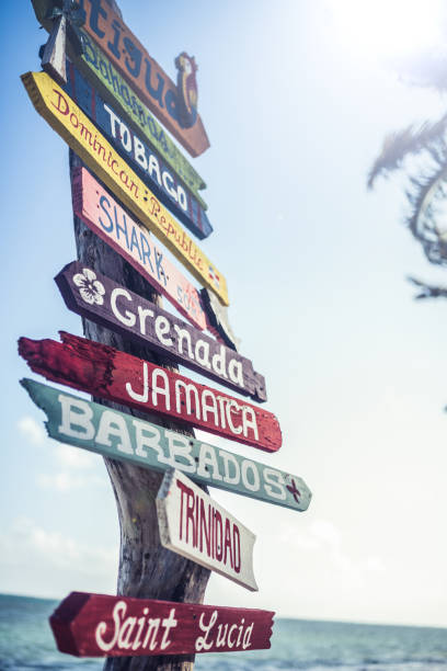 istock Multicolored sign showing many Caribbean travel destinations 1393582425