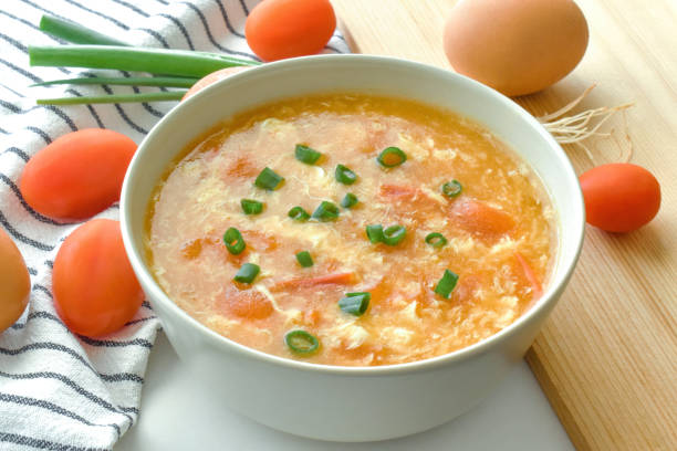 istock Tomato egg drop soup in a white bowl. 1393582778