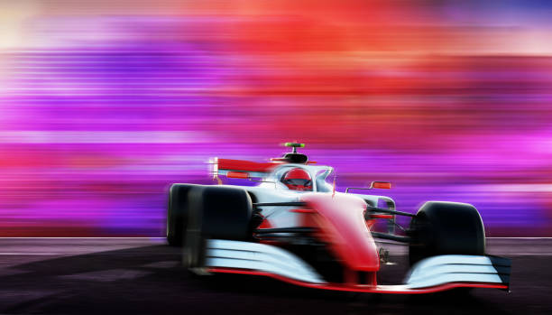 istock red race car driving on a race track 1393586764