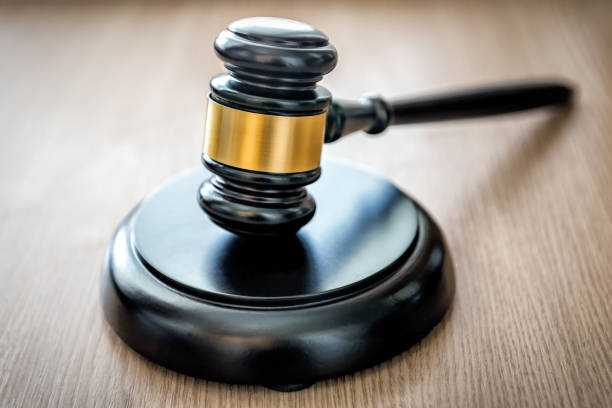 istock Judges gavel on wooden desk 1393586768
