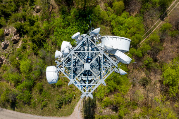 istock Communications tower - aerial view 1393587999