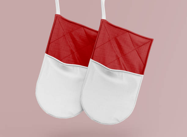 istock Red oven gloves hanging 1393589528