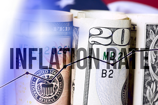 Flag of America, dollar banknotes and the inflation rate in USA