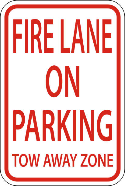 istock Fire Lane No Parking Tow Away Zone Sign On White Background 1393598518
