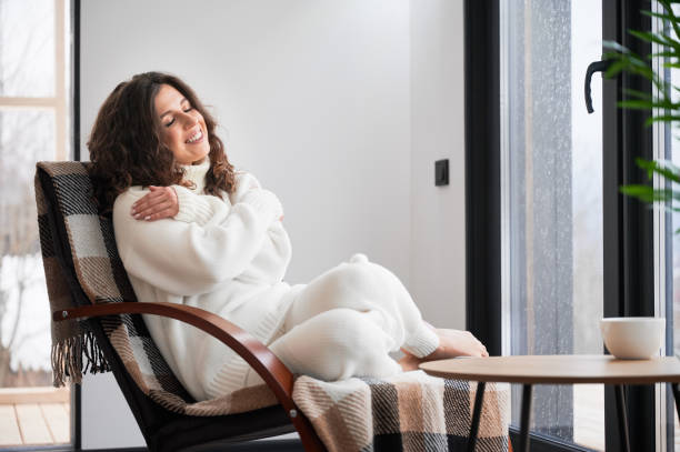 istock Young woman enjoying weekends inside modern barn house. 1393598718