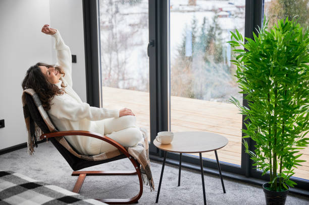 istock Young woman enjoying weekends inside modern barn house. 1393598751