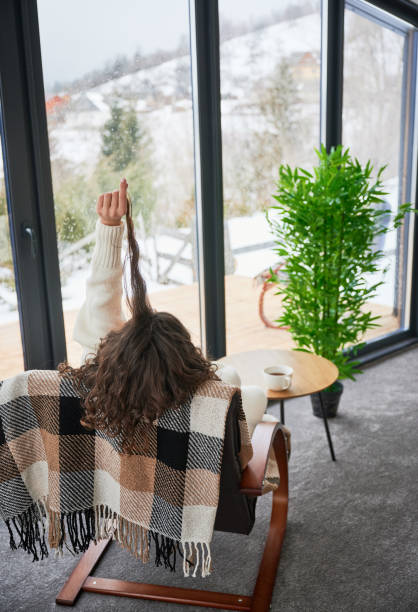 istock Young woman enjoying weekends inside modern barn house. 1393598771