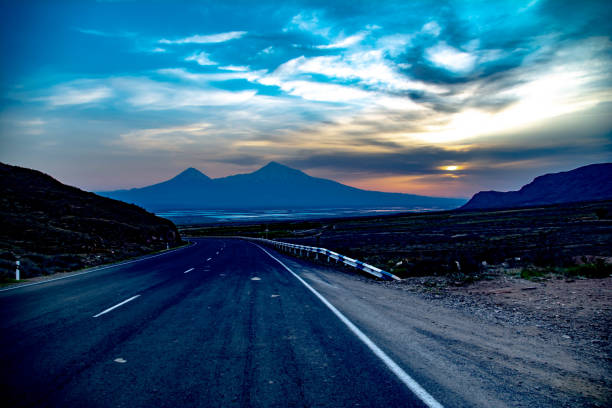 istock Road and beautiful Mount Ararat. Sunset over the mountain 1393602024