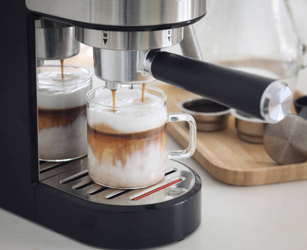 istock A clear glass cup of dirty coffee latte 1393610407