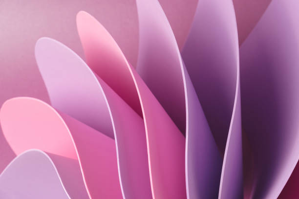 istock Pink and violet abstract shapes on a purple background. 1393610476