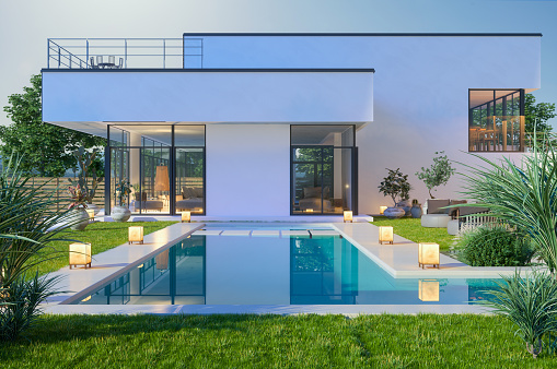Exterior de lujosa villa moderna con piscina y jardín photo