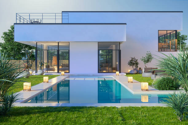 Exterior Of Luxurious Modern Villa With Swimming Pool And Garden Exterior Of Luxurious Modern Villa With Swimming Pool And Garden pretty beach house stock pictures, royalty-free photos & images