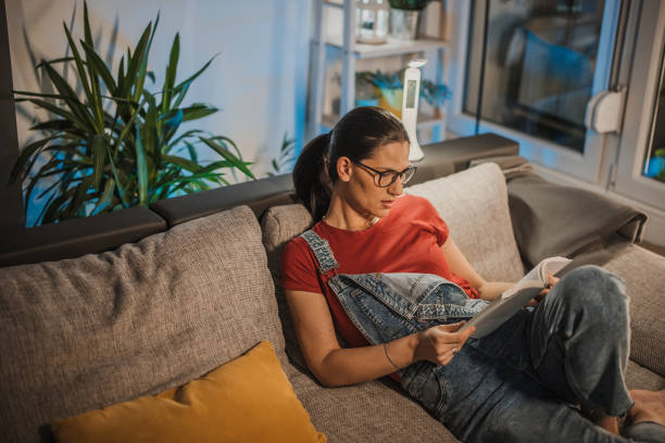 istock Woman enjoys reading 1393610667