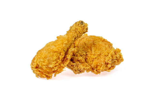 istock Crispy fried chicken breast and drumsticks isolated on white background whit clipping path, fresh yellow, crispy fried chicken, delicious, 1393611990