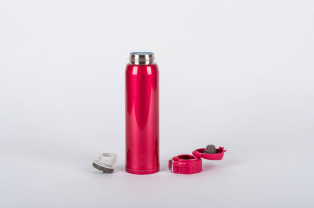 Large green plastic thermos flaskon a white background