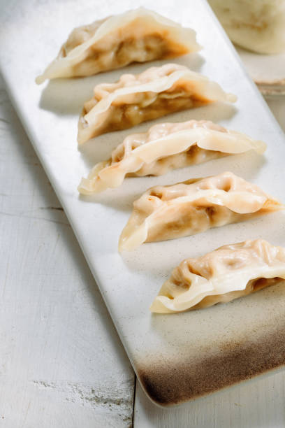 istock Dumplings, steamed stuffed buns, soybean milk 1393614313