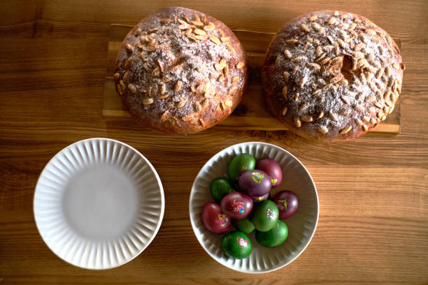 Bowl of Easter eggs and freshly backed Easter sweat bread (Mazanec)