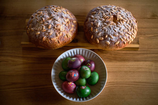 Bowl of Easter eggs and freshly backed Easter sweat bread (Mazanec)
