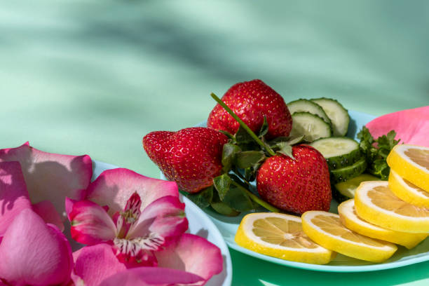 Most popular and effective rejuvenating face masks. Strawberry, cucumber, parsley, lemon juice. Turquoise background