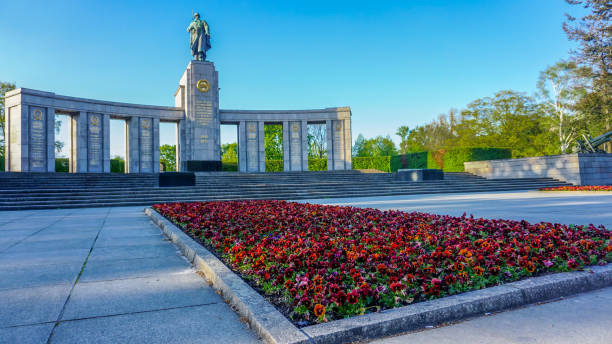 istock Great stone and marble monument with a tall iron statue in the middle. 1393622793