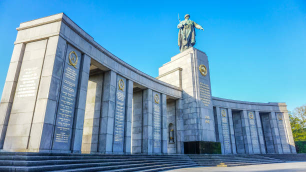 istock Great stone and marble monument with a tall iron statue in the middle. 1393622906