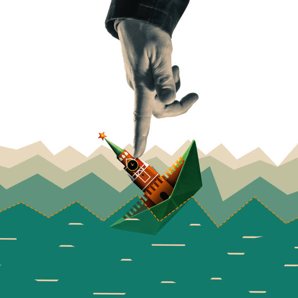 The paper boat with the Kremlin tower is sinking under pressure from Western countries. Art collage.