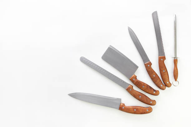 istock Set of professional kitchen knives on white background with copy space. Chef, restaurant or kitchen concept. 1393625687