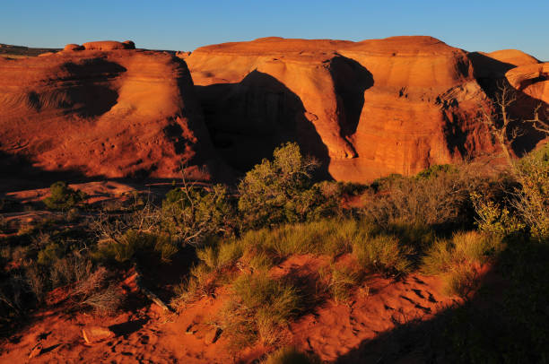 istock Sunset on rounded sandstone hills at Arches National Park 1393627323