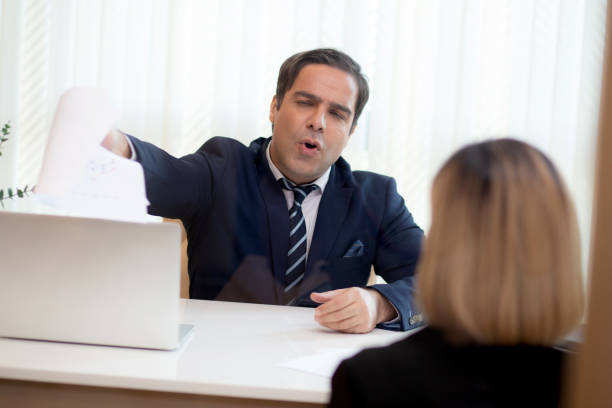 istock Executive or boss angry and complaining employee with work failure at meeting room in the office, manager or entrepreneur furious and annoyed staff with mistake, business and communication concept. 1393630295