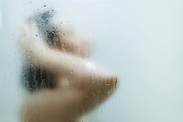 istock Woman enjoy taking a bath and shower. 1393631887
